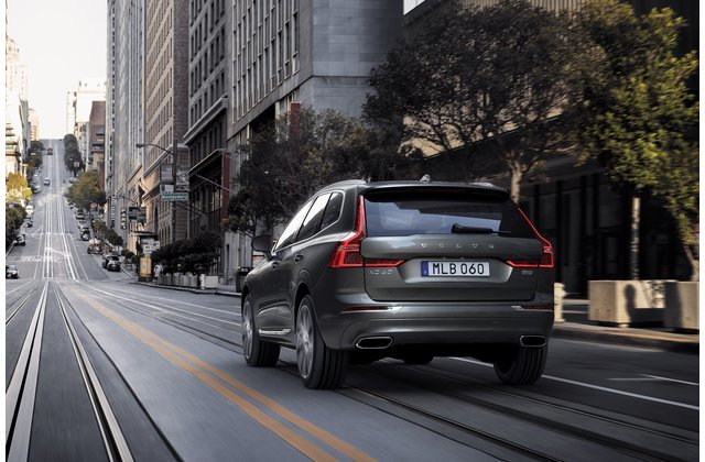 Image of a grey Volvo driving down a road to set the theme of how to sell your car